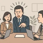 会議中に強く意見を押し付ける男性社員と、困惑した表情で聞く同僚たちを描いた日本人会社員のイラスト